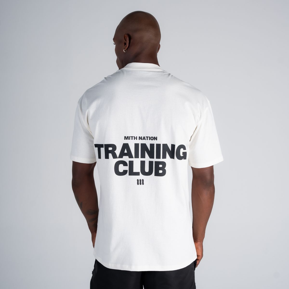 Camiseta Oversized Mith Nation Training Club Off White