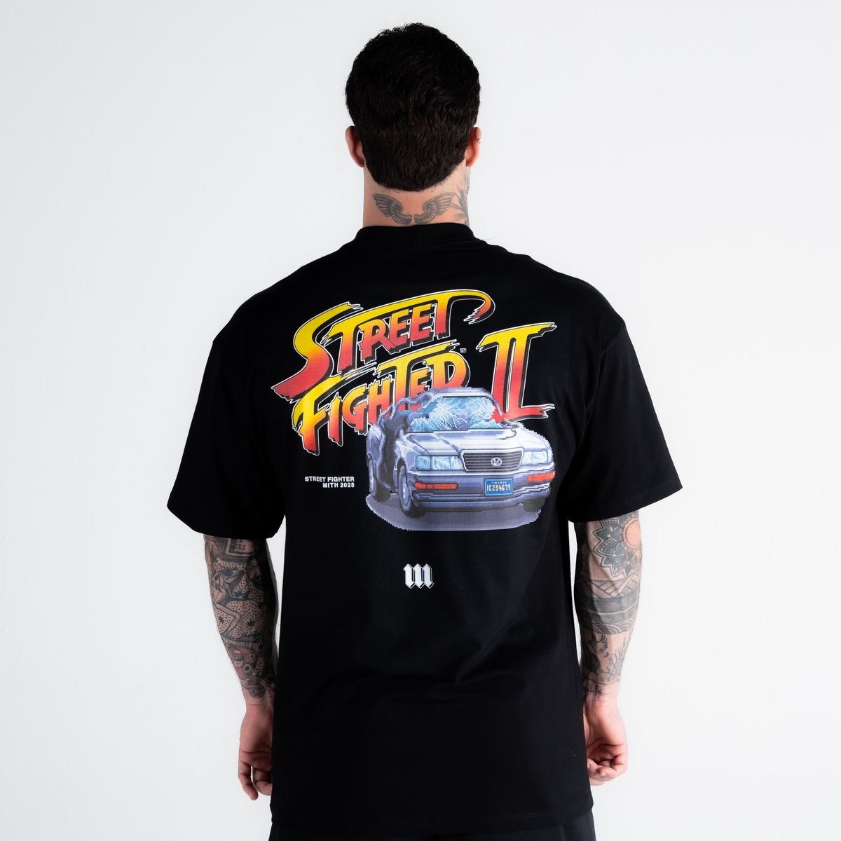 Camiseta Oversized Street Fighter Car Stage Bonus Preto